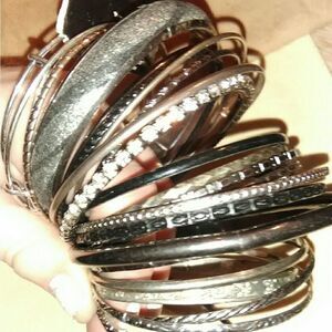 23 different bangle bracelets 